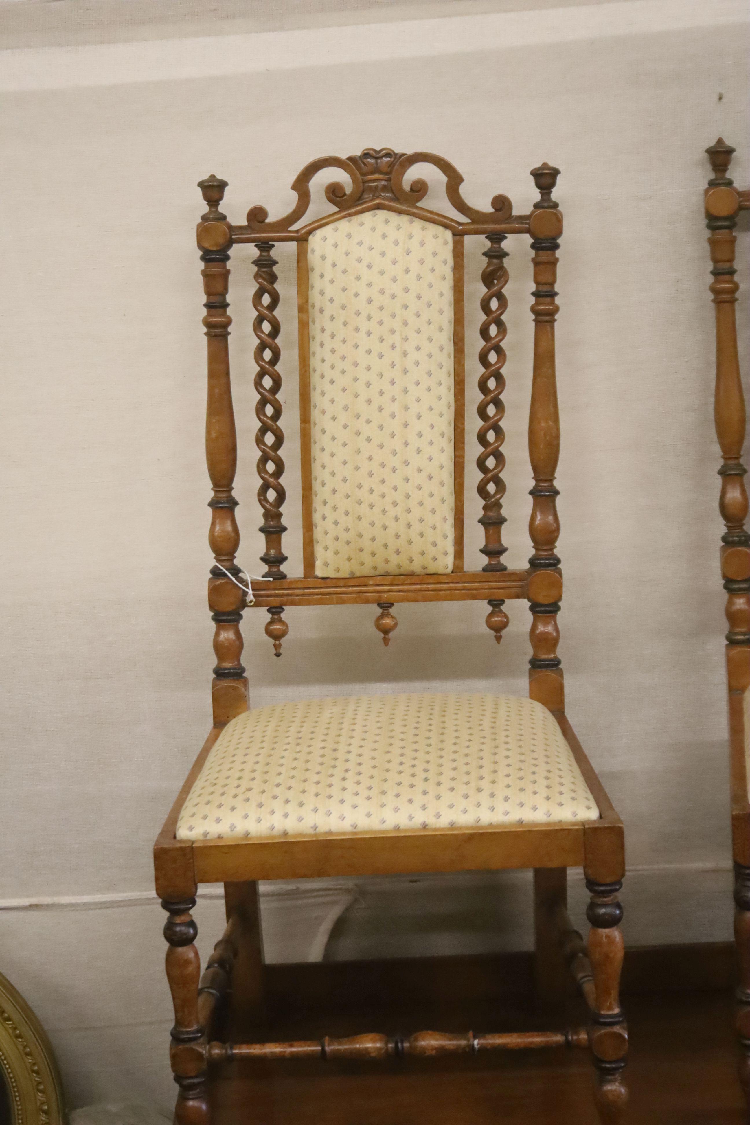 A pair of late Victorian turned walnut side chairs